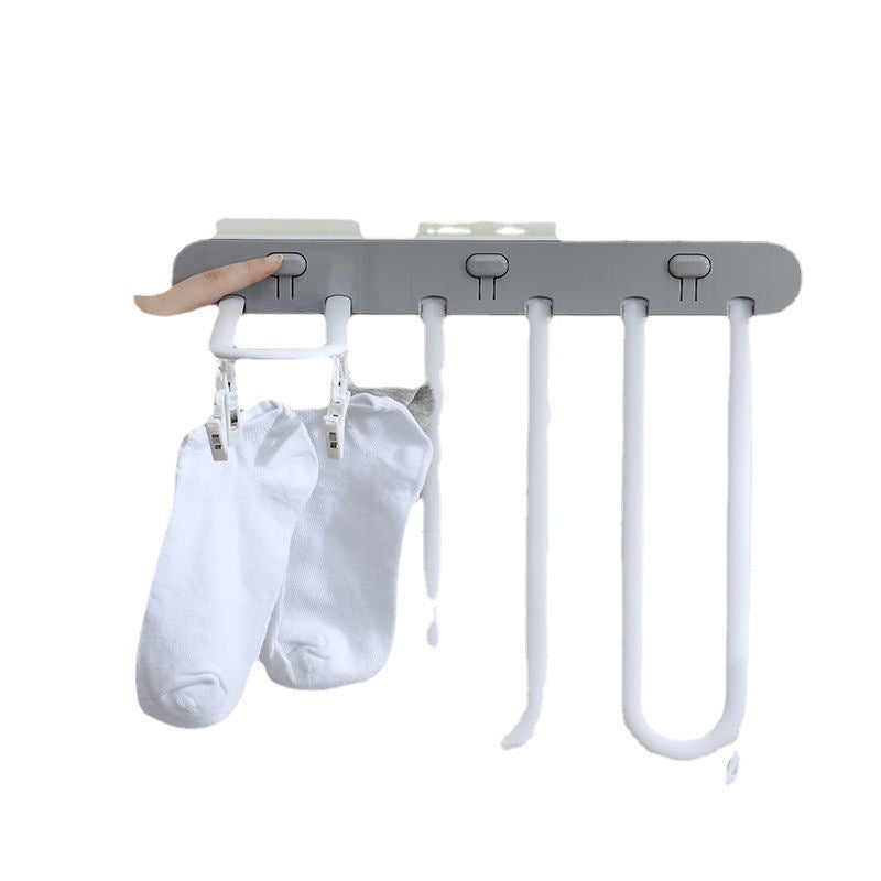 Étendoir à linge pour balcon avec plusieurs pinces à linge