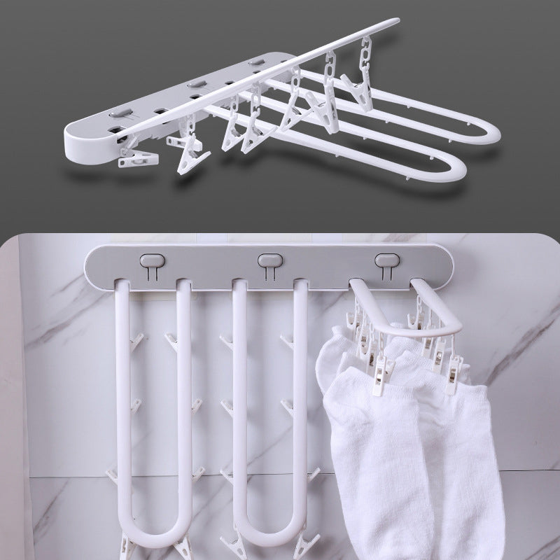 Étendoir à linge pour balcon avec plusieurs pinces à linge